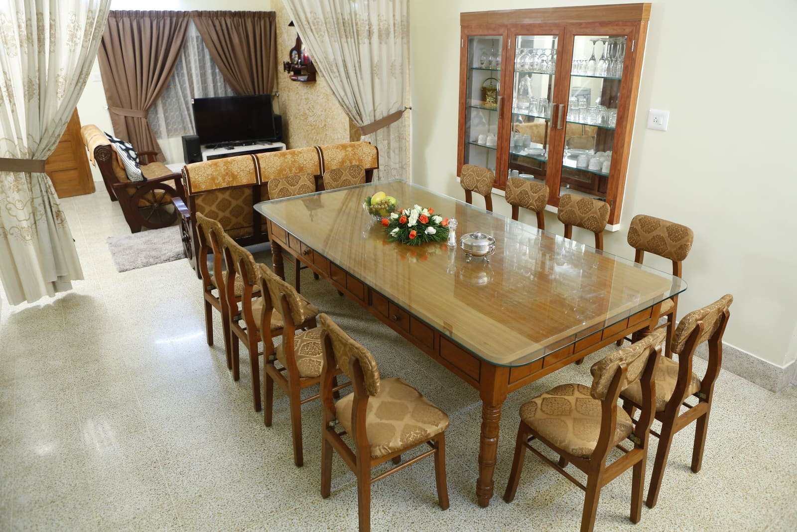 The dining table on the ground floor, laid for ten